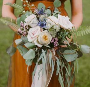 Garden roses and natural elements in a bridal bouquet by Garden by the Gate Floral Design. Photo by Mallory + Justin Photography