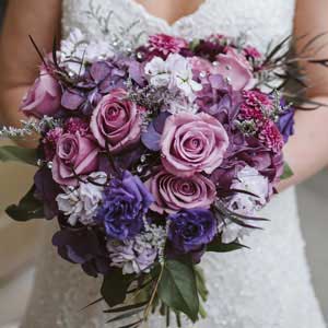 Lavender and purple brides bouquet by Garden by the Gate Floral Design